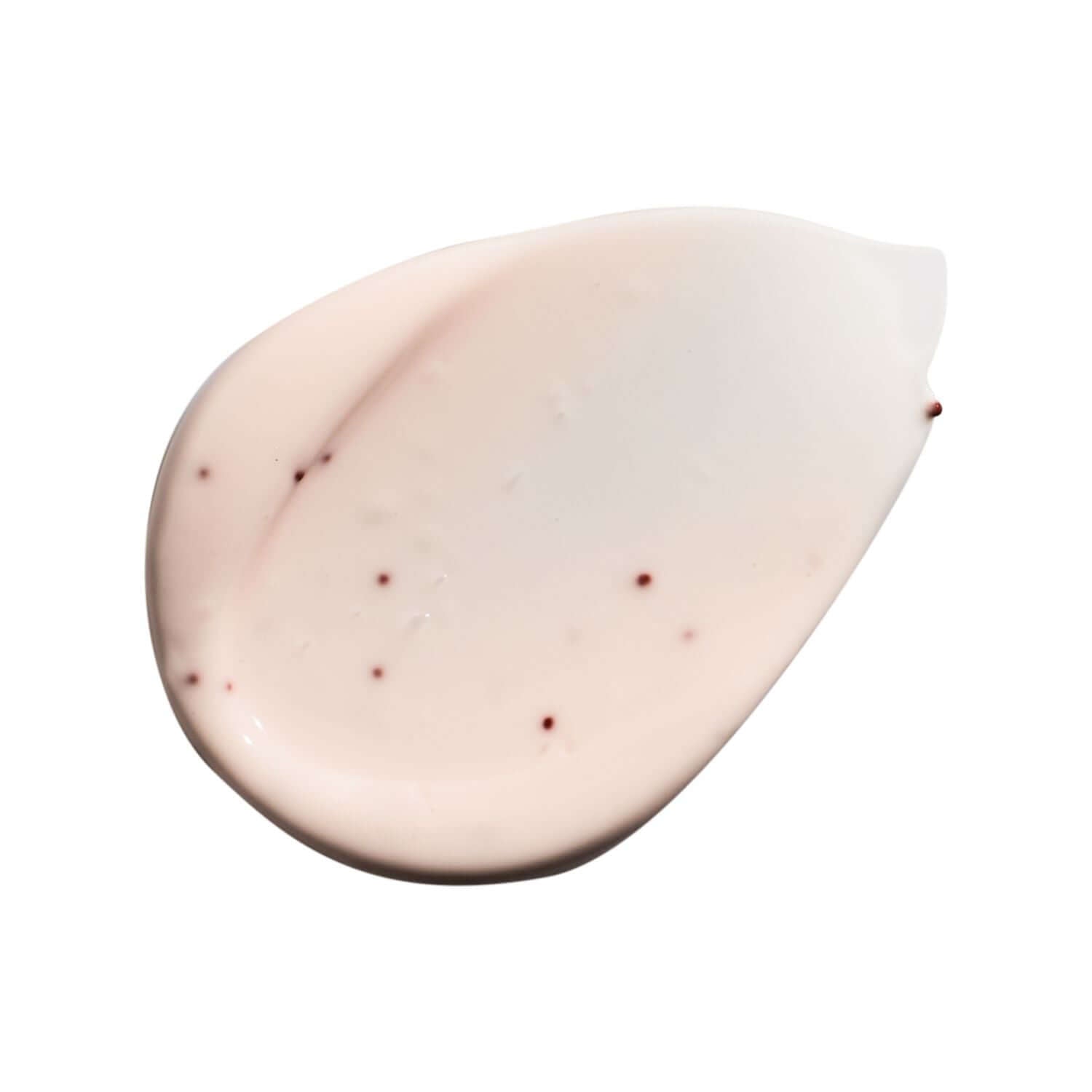 Delicate pink cream texture of a skin care mask with small red specks, ideal for skin rejuvenation.